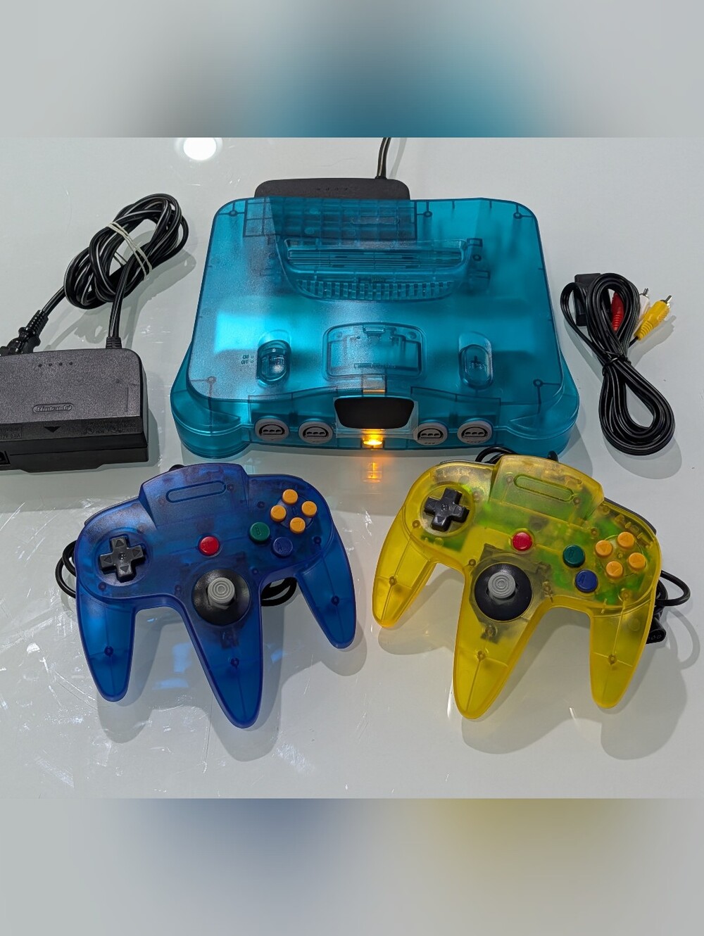 Transparent Ice Blue Nintendo 64 N64 Videogame Console (NUS-001) with Jumper Pak